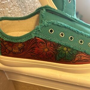 Montana West slip on sneakers with leather embossed detail. NWOT size 10